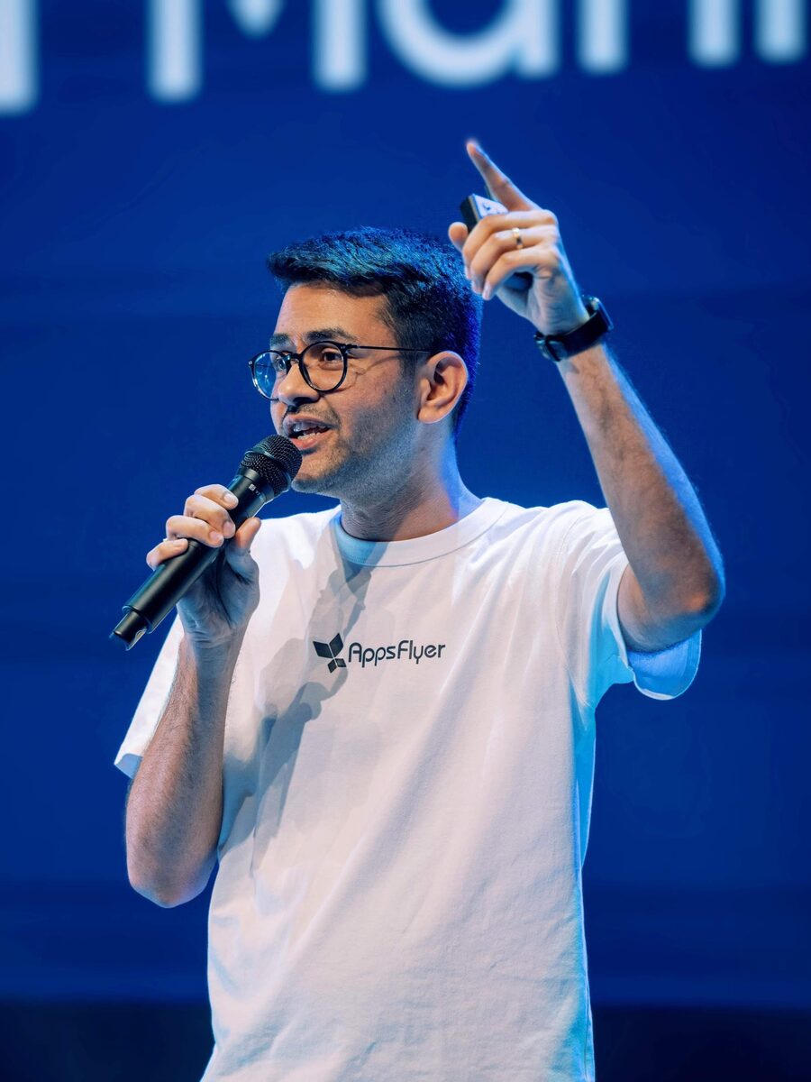 Speaking on a conference stage